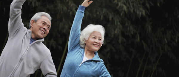 Senior couple stretching